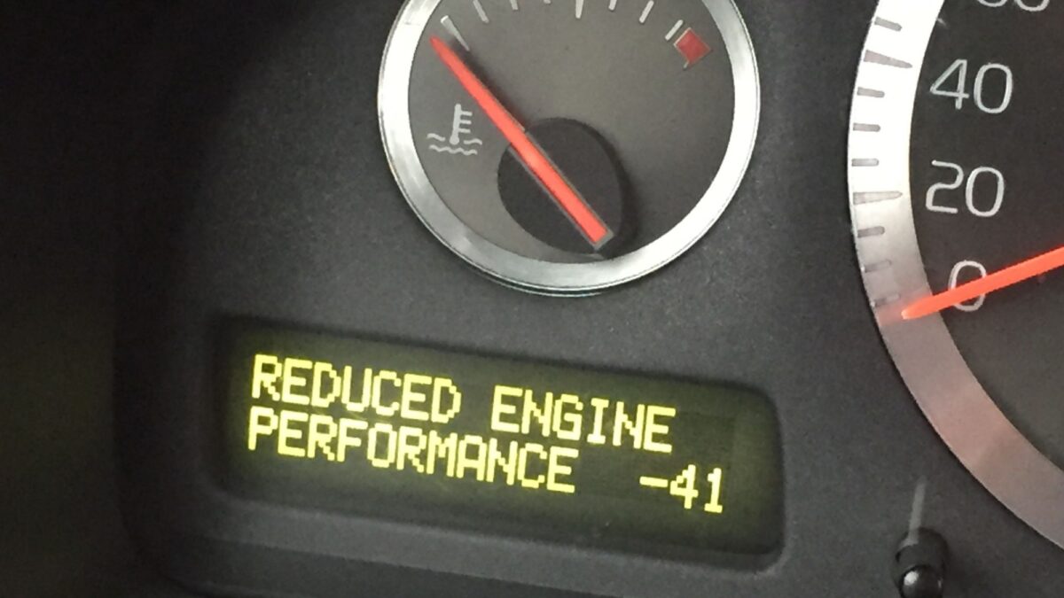 A car speedometer showing low engine performance