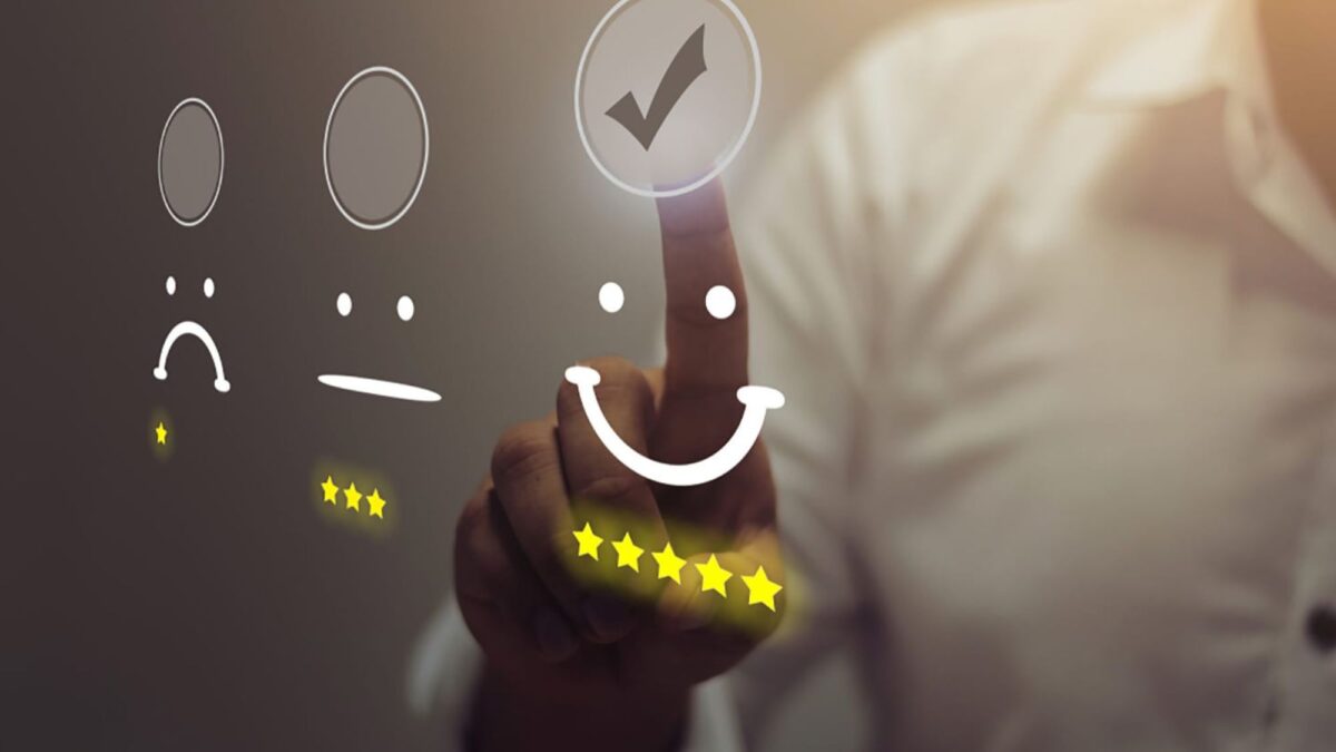 A man making smilies with his finger showing customer service experience