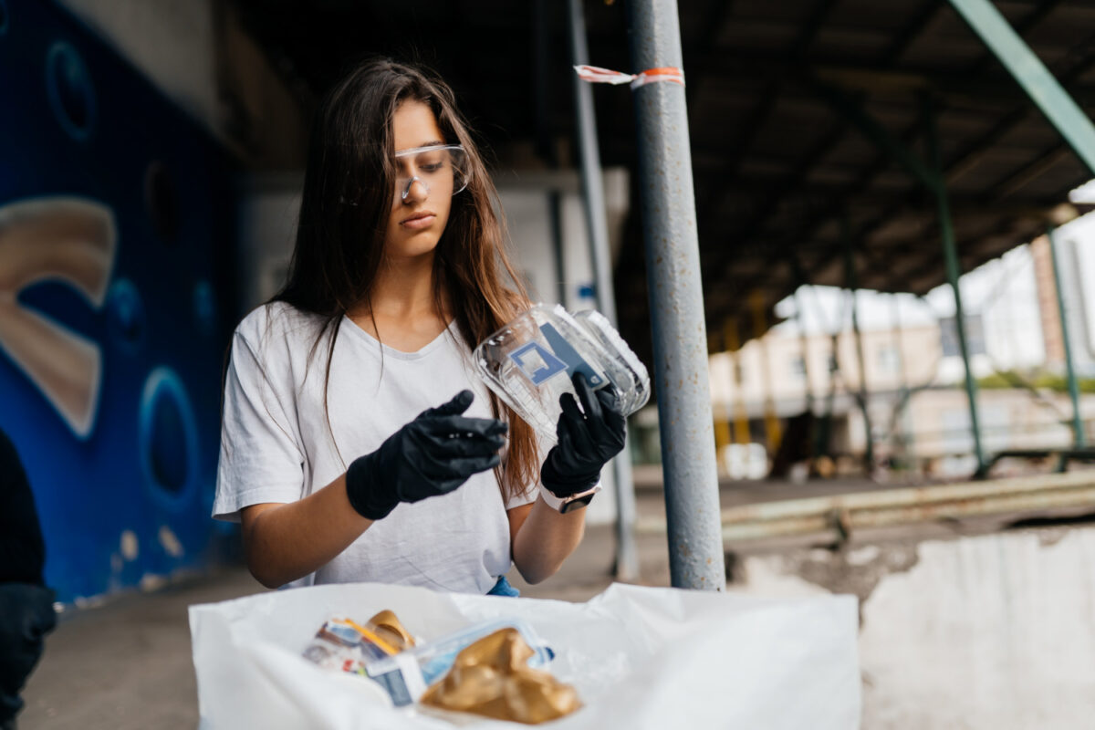 woman busy in workplace waste disposal