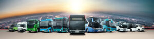 A fleet of luxury and standard buses from Bus Rental Dubai lined up in front of the iconic Dubai skyline at sunset.