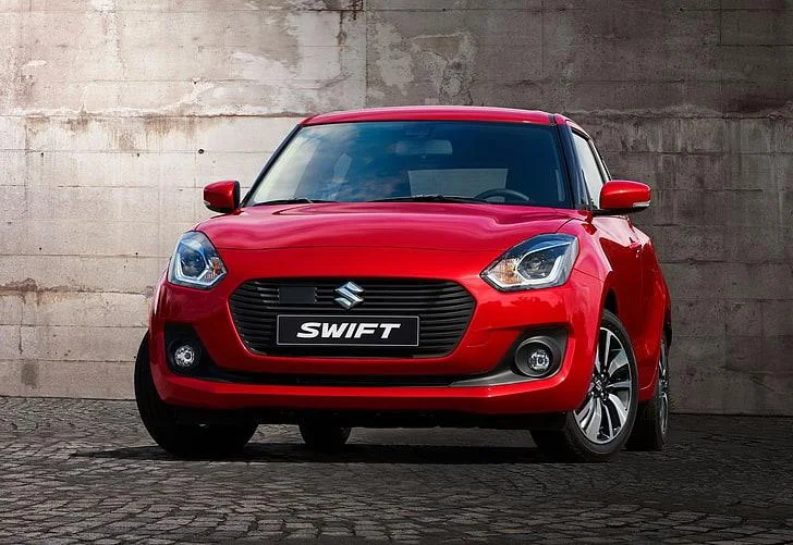 red swift car self drive