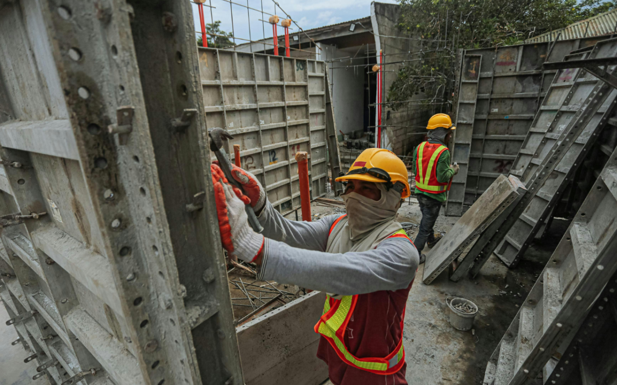 Man working in construction site with OSHA 10 Certification