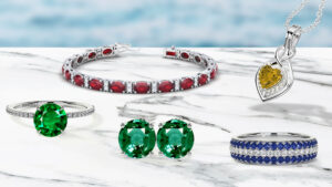 a collage of ruby diamond bracelet, emerald stone engagement rings, eternity bands, Alexandrite Earring, june birthstone necklace